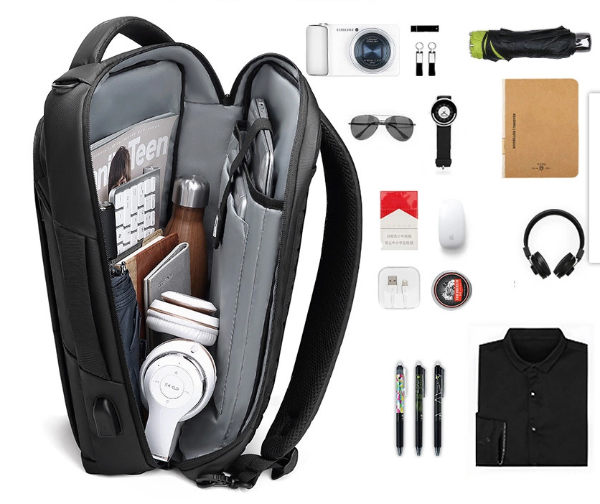 Outwalk backpack interior compartment storage space display. Shows what can be stored inside the main compartment.